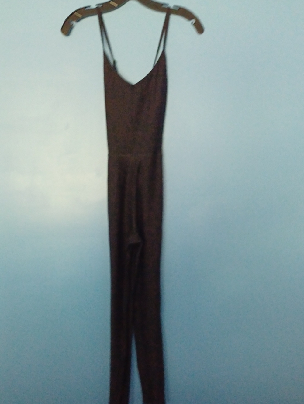 Spaghetti-Strap Slim Jumpsuit in Black.